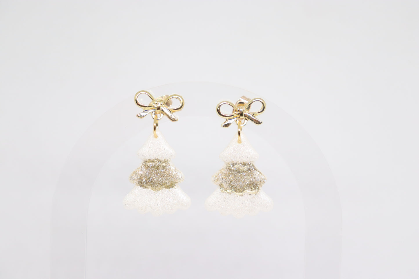 Witte kerstboomoorbellen strik