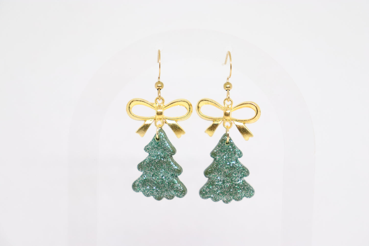 Groene kerstboomoorbellen strik