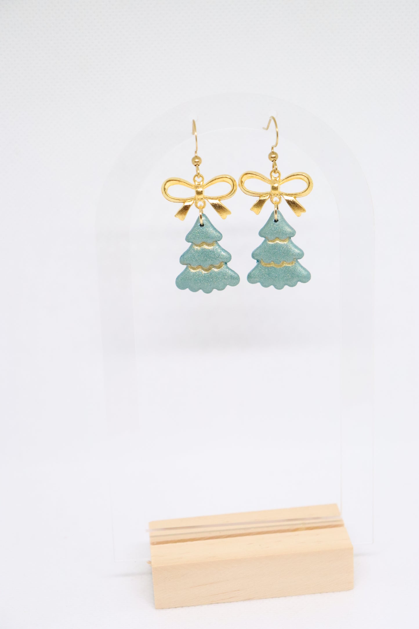 Groene kerstboomoorbellen strik