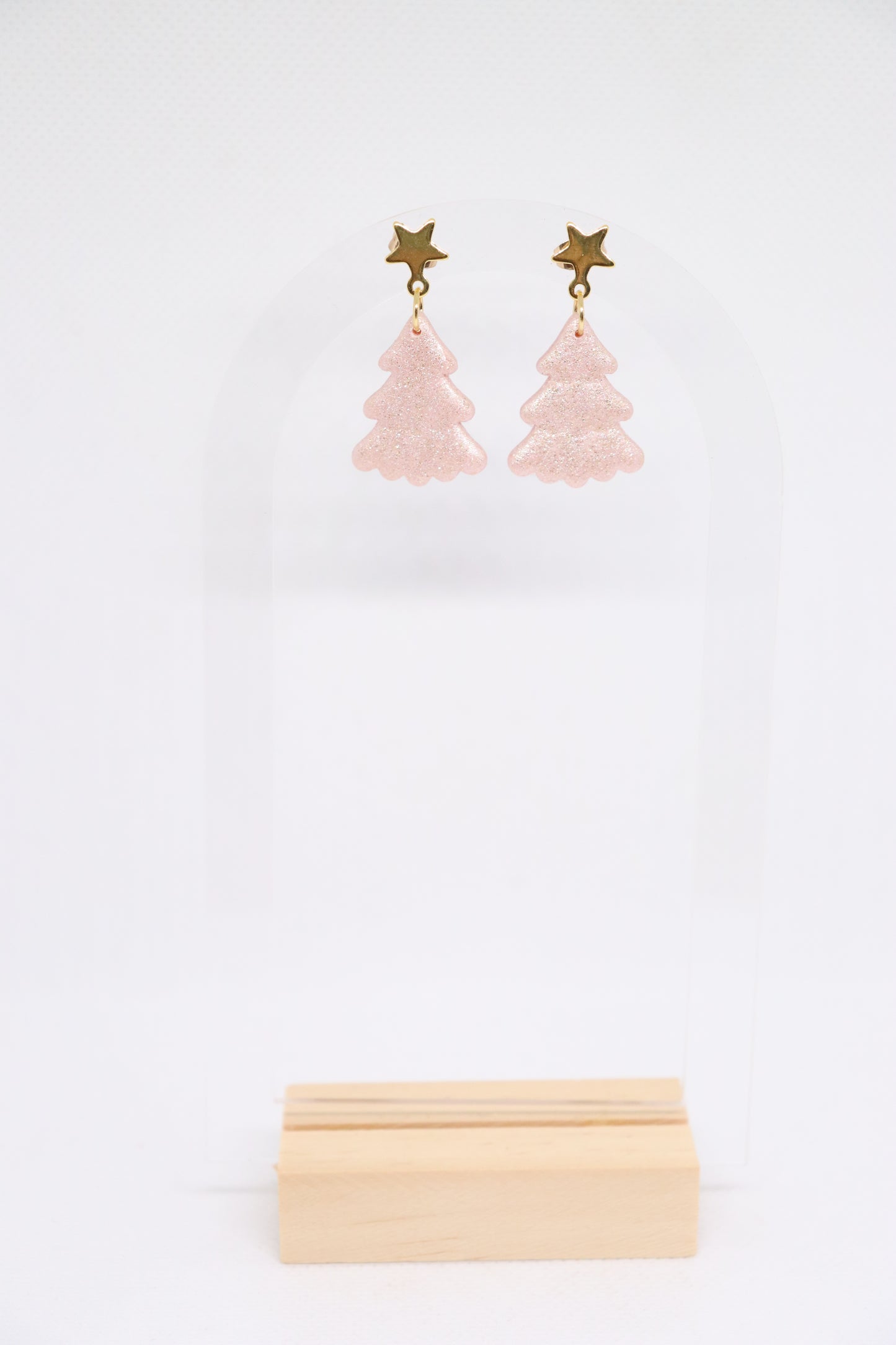 Roze kerstoorbellen ster