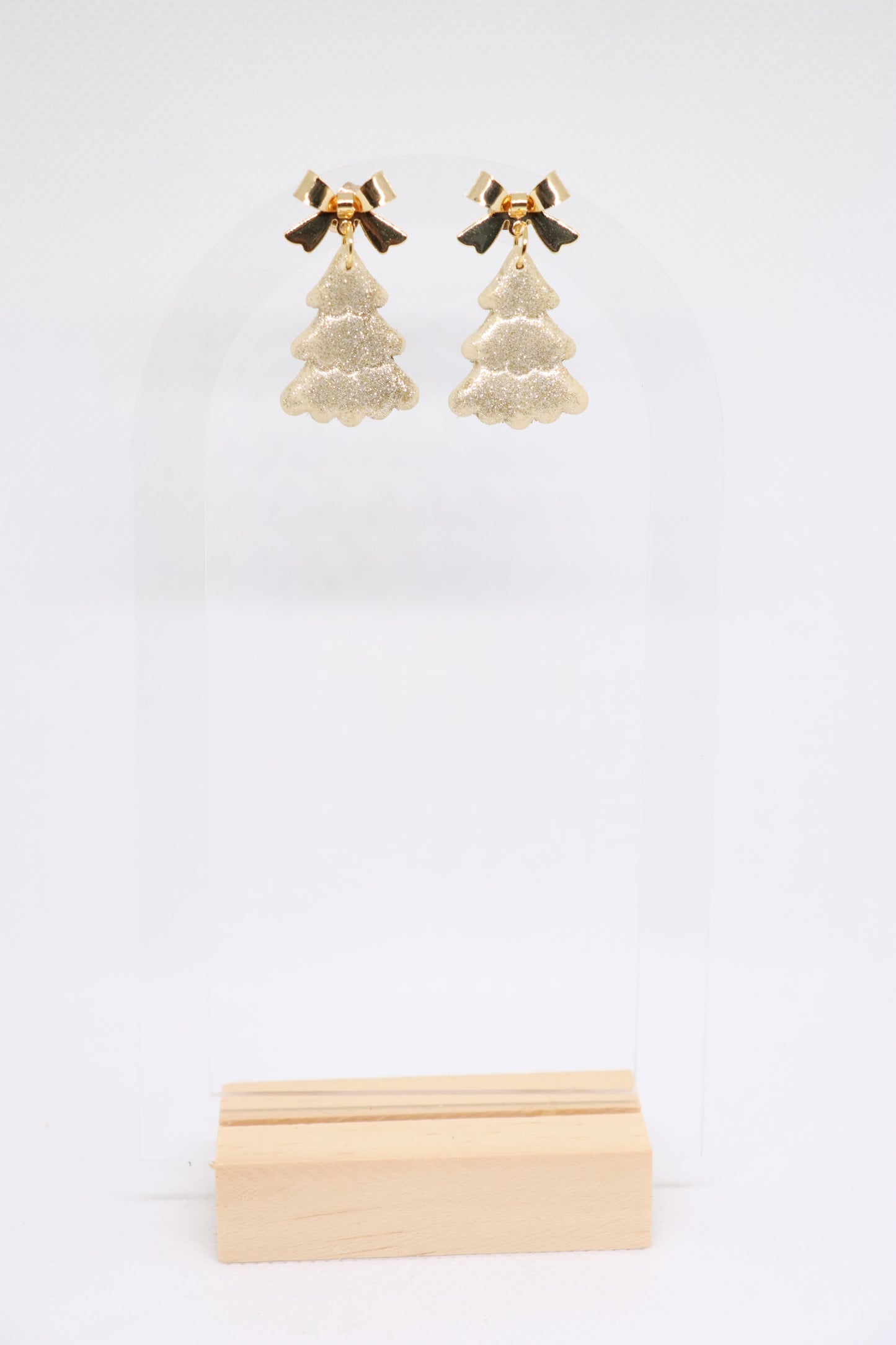 Beige kerstboomoorbellen strik