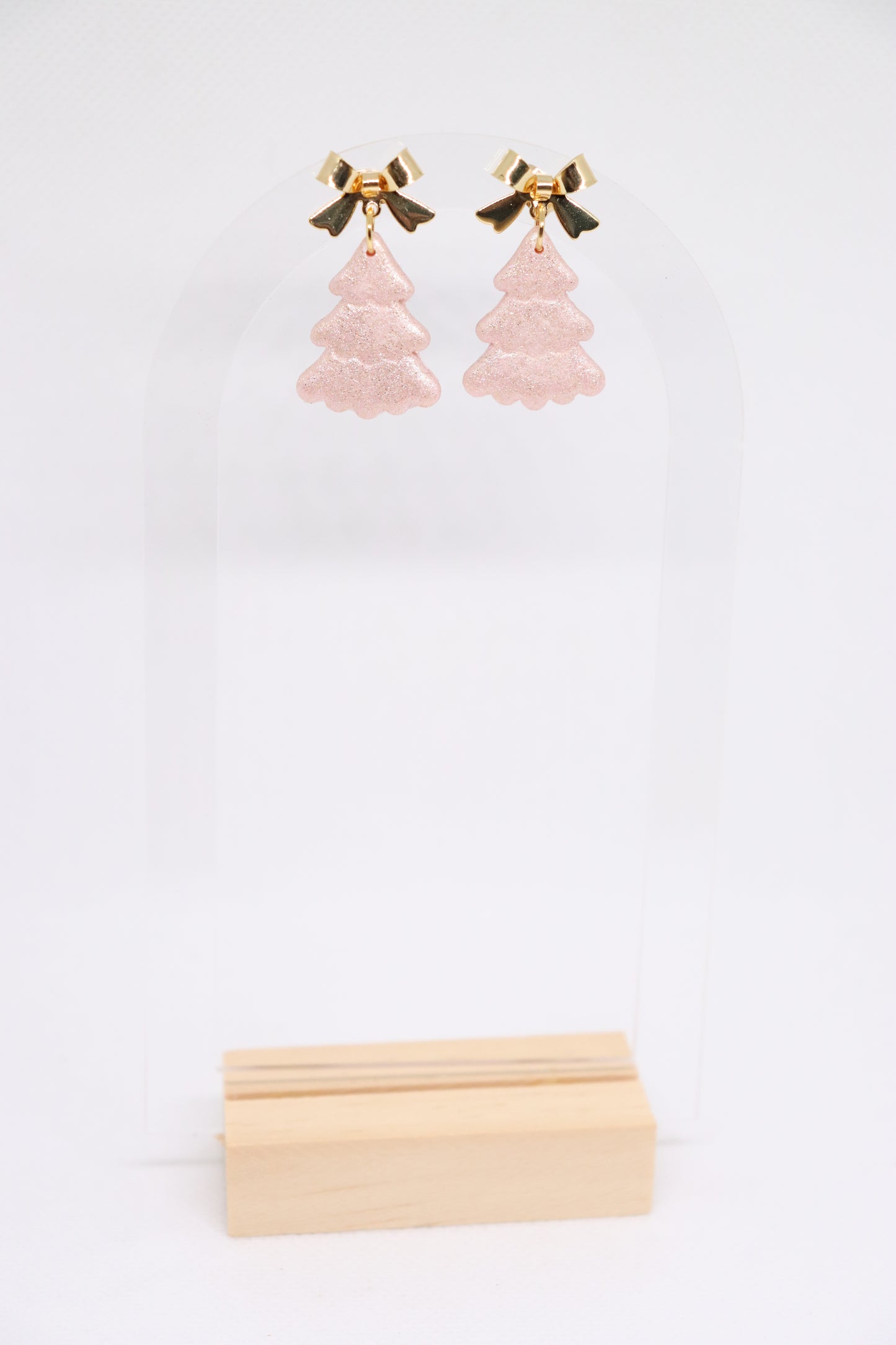 Roze kerstboomoorbellen strik