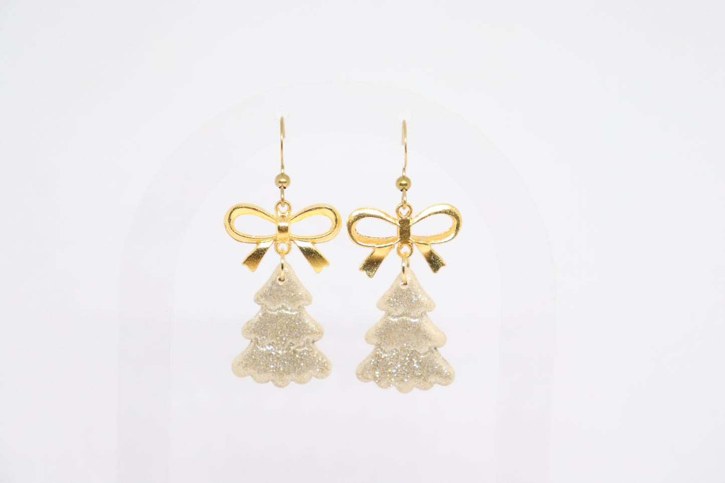 Beige kerstboomoorbellen strik