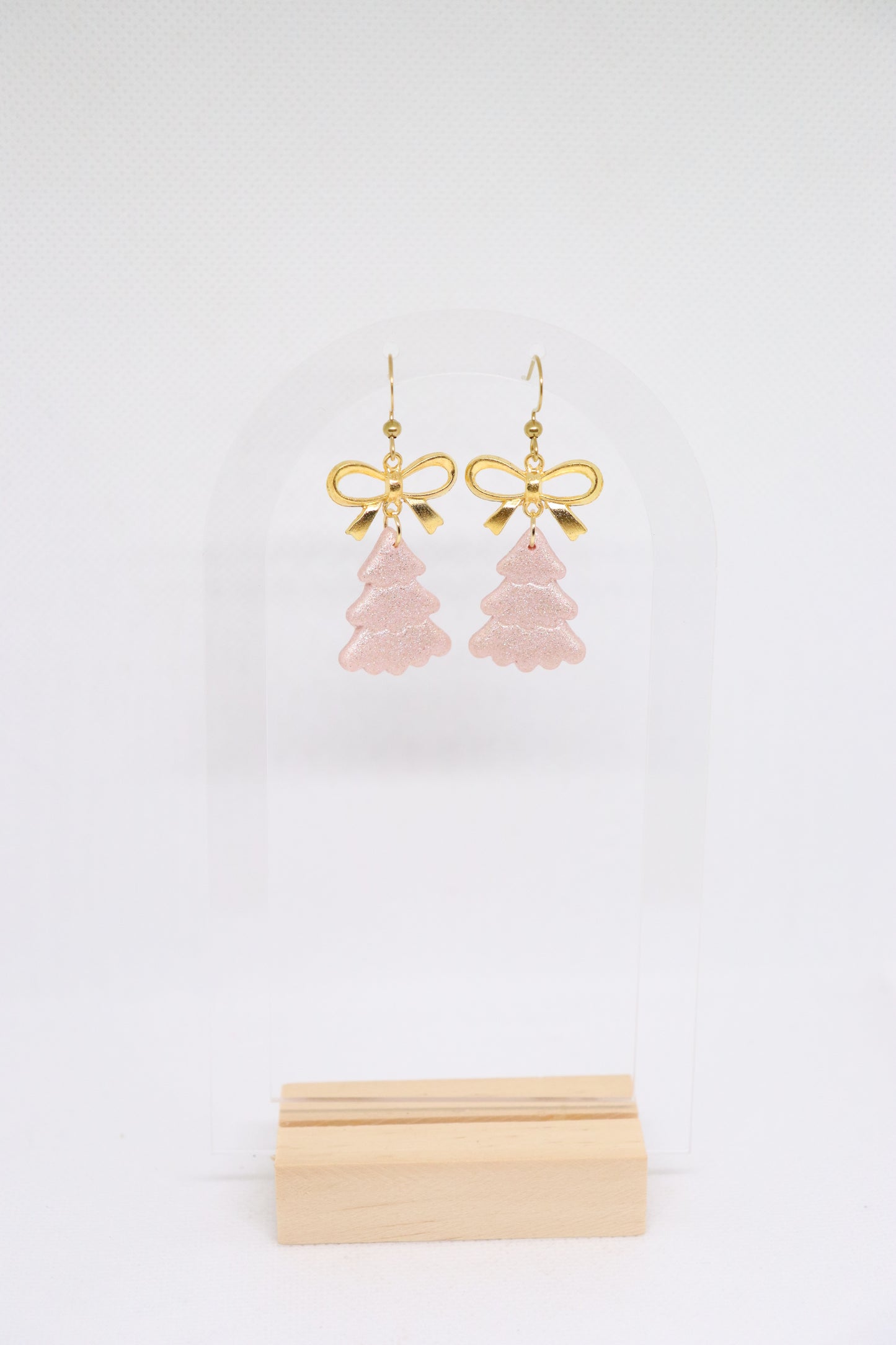 Roze kerstboomoorbellen strik