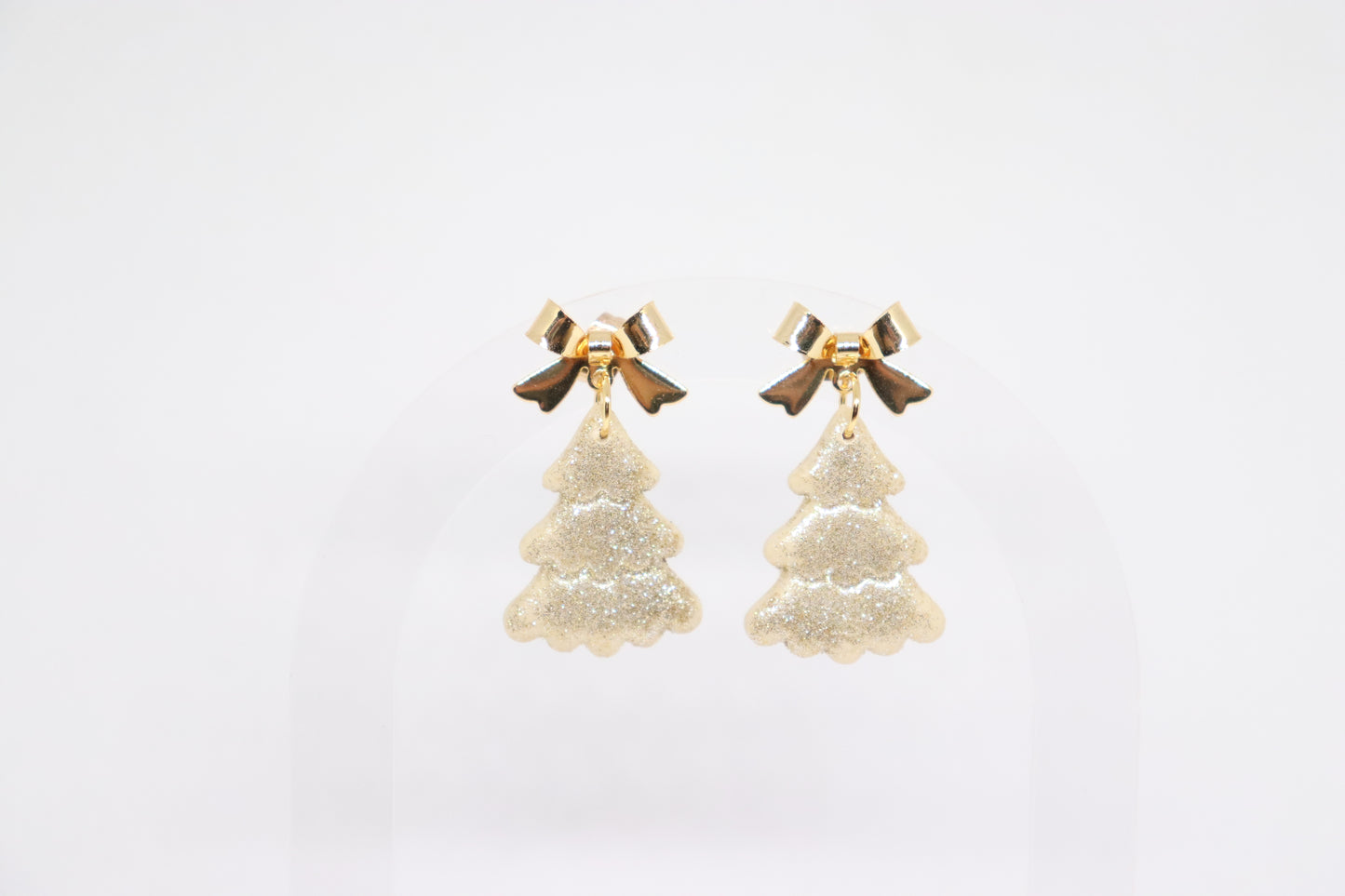 Beige kerstboomoorbellen strik