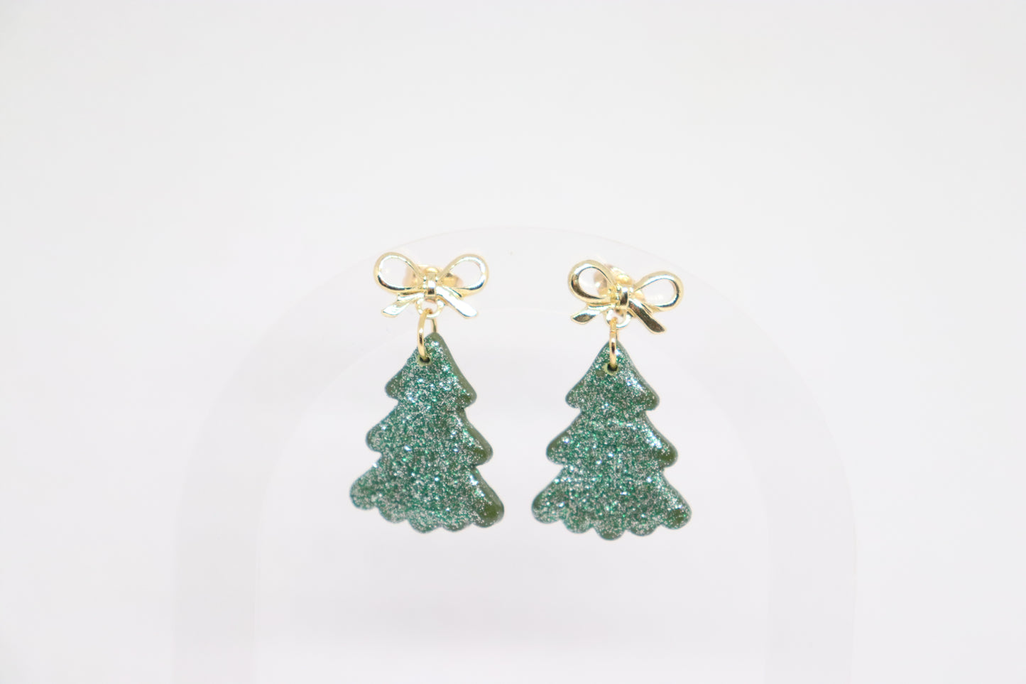 Groene kerstboomoorbellen strik