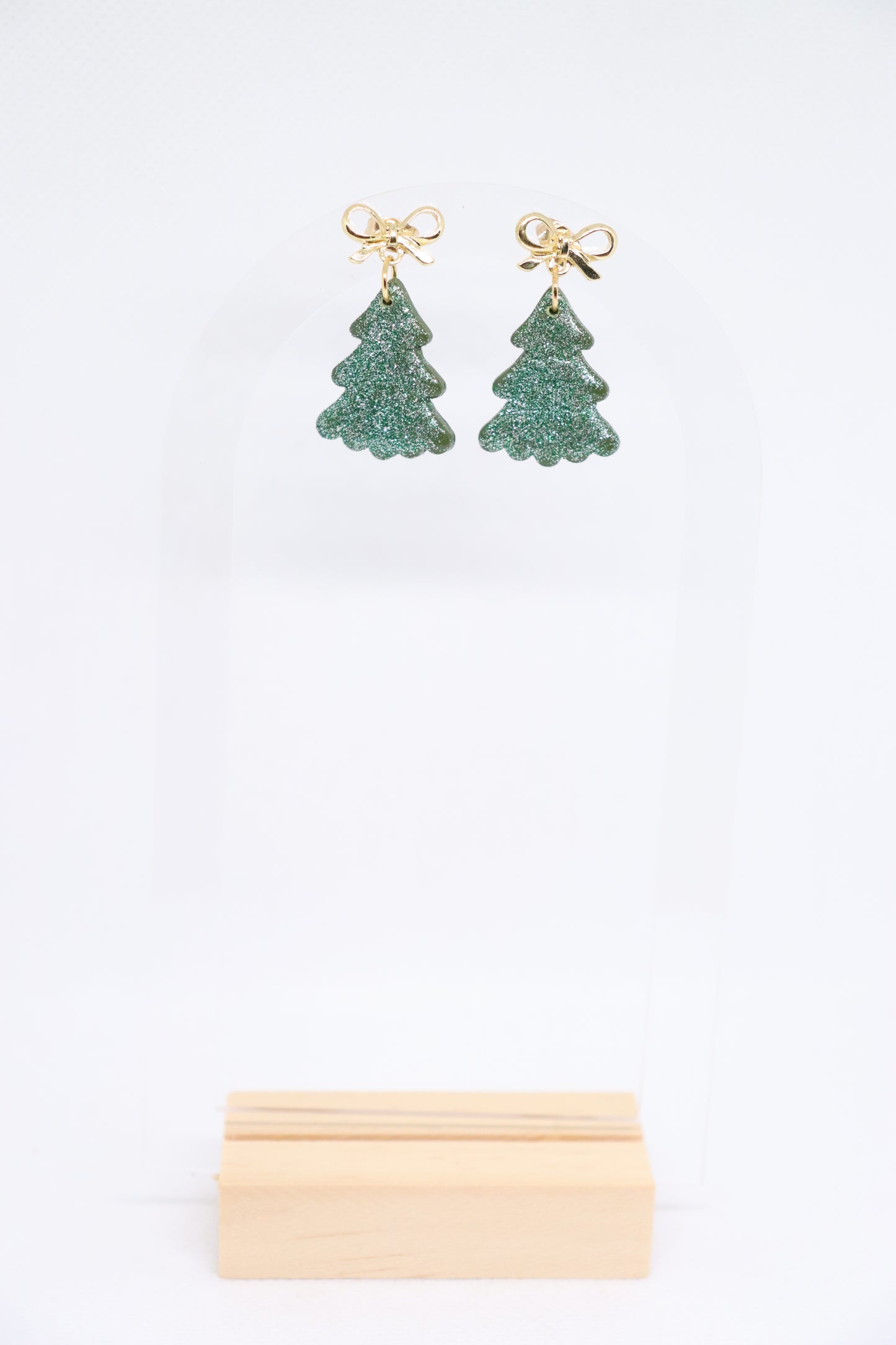 Groene kerstboomoorbellen strik