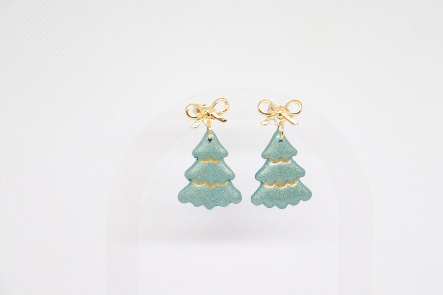 Groene kerstboomoorbellen strik