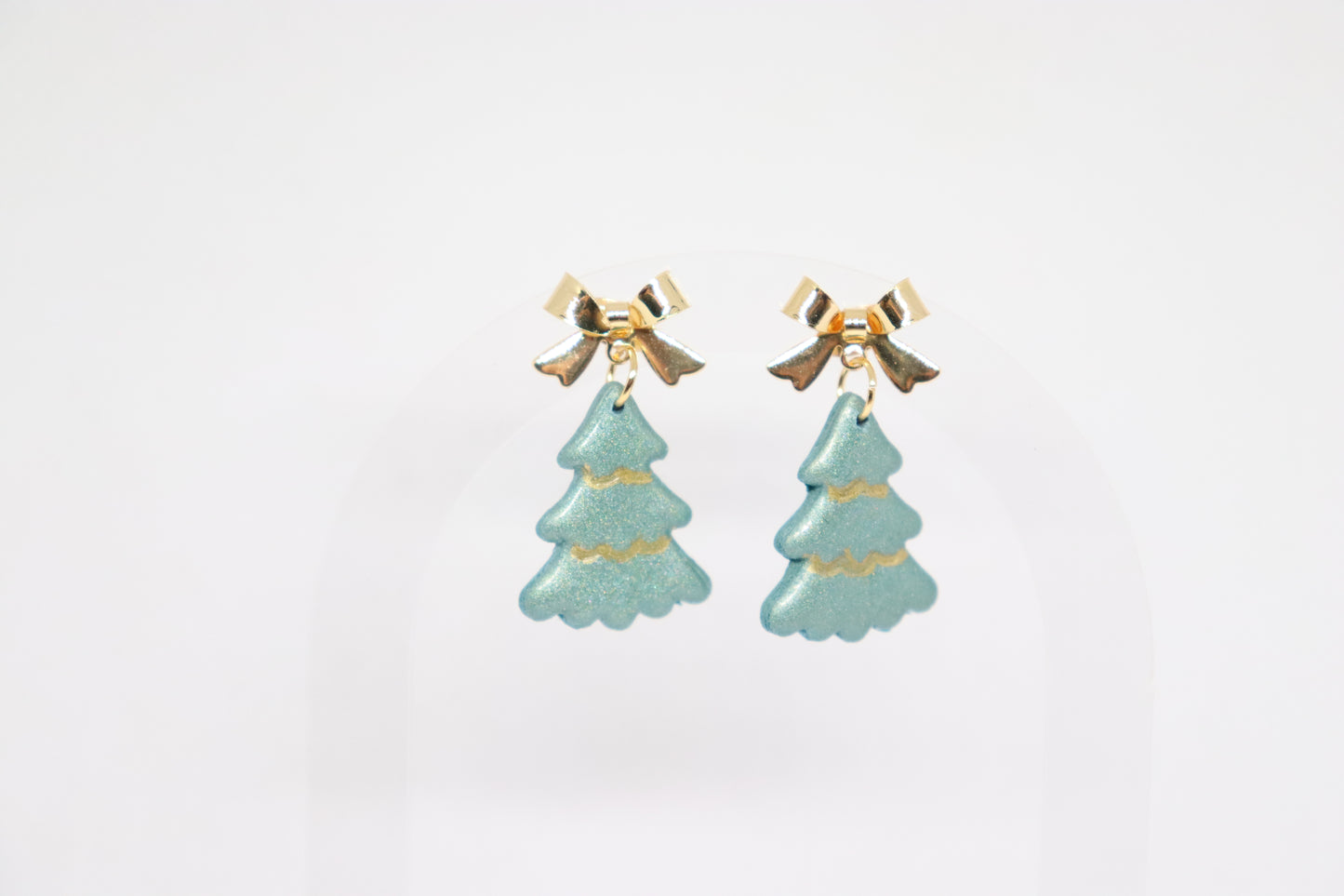 Groene kerstboomoorbellen strik