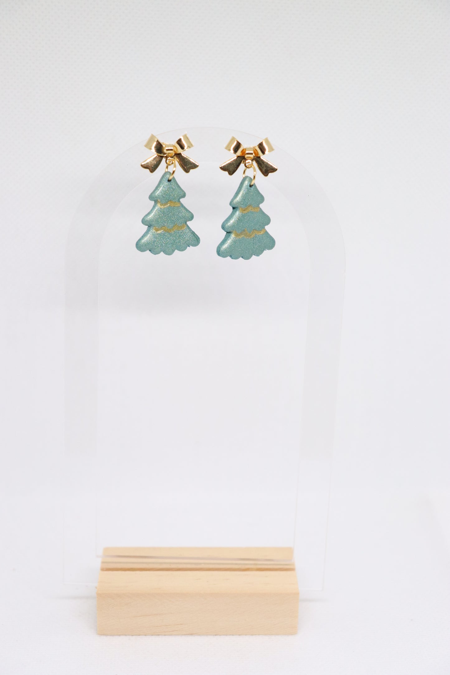 Groene kerstboomoorbellen strik