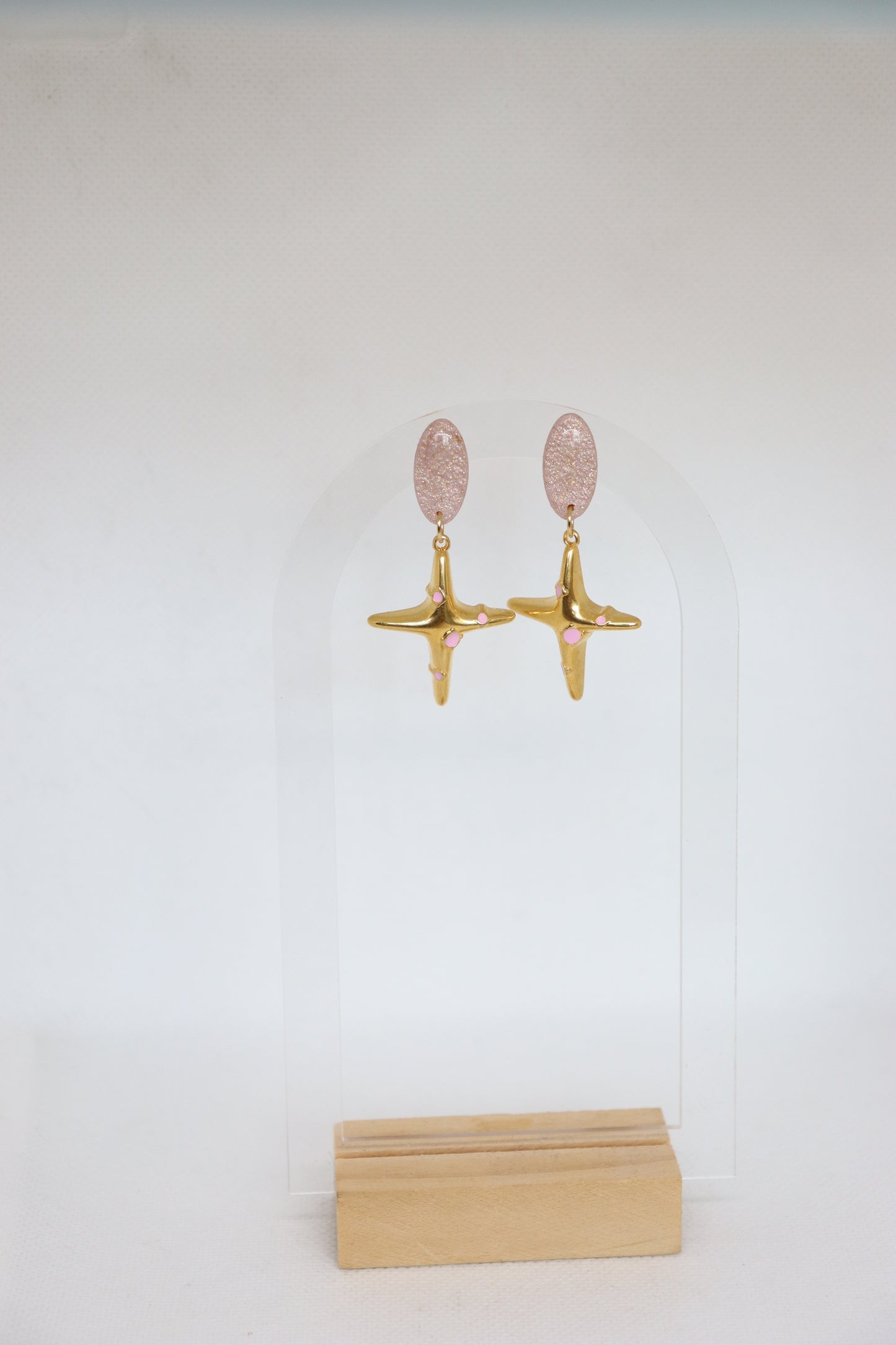 Pink oorbellen Jezus